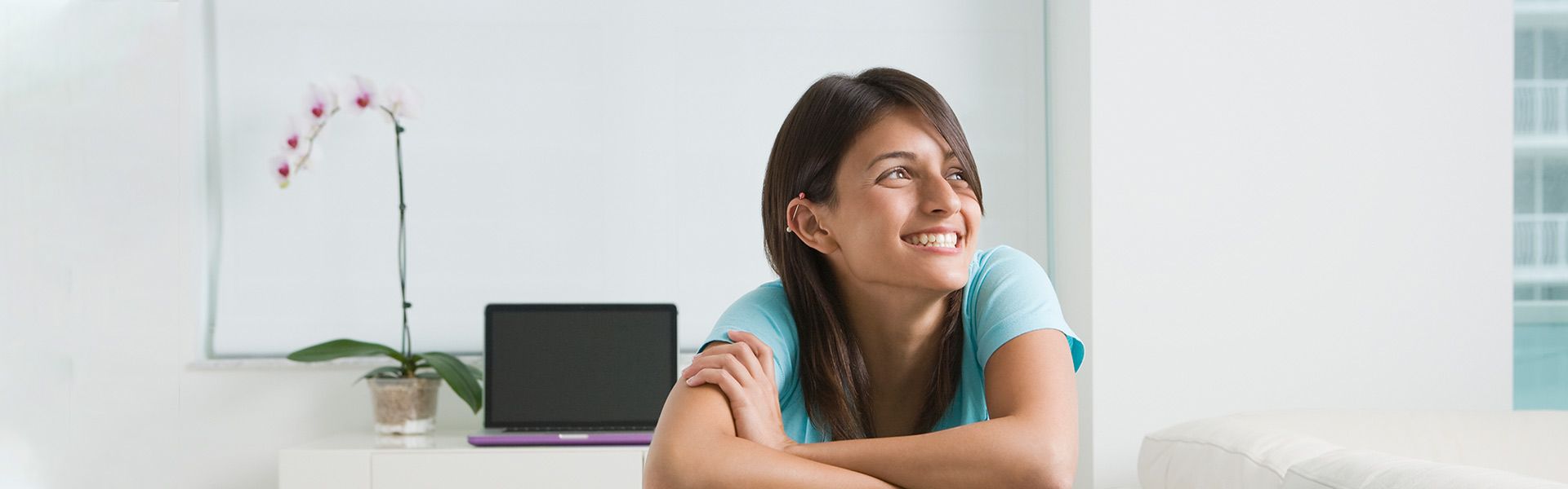 Teen girl sitting in backwards chair