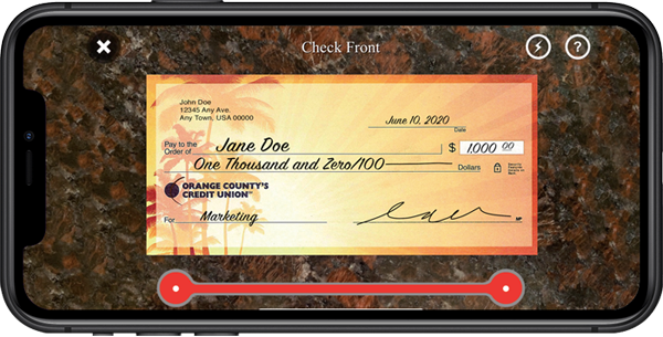 Image of phone making mobile check deposit on Orange County's Credit Union app