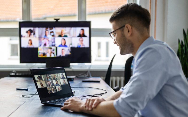 Man working from home on a virtual meeting