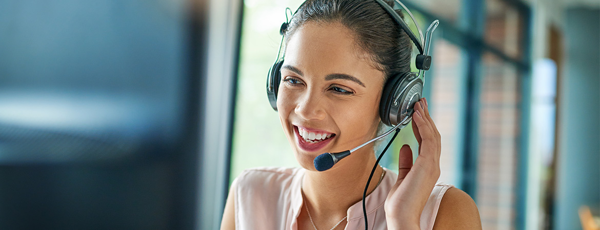 Credit counselor on the phone providing assistance to a Member