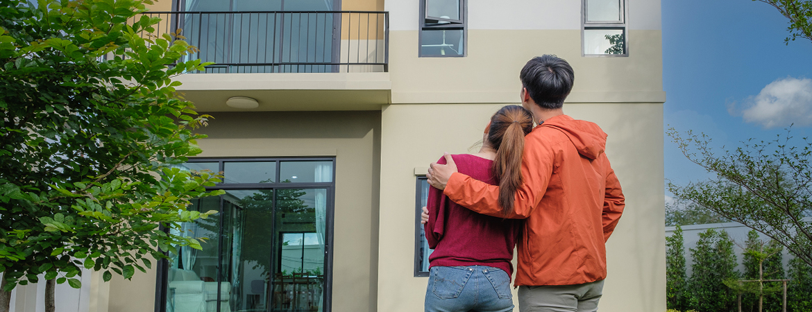 Couple looking at home for sale